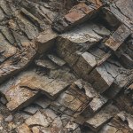 Layers-and-cracks-in-sedimentary-rock-on-cliff-face (1)