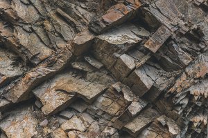 Layers-and-cracks-in-sedimentary-rock-on-cliff-face (1) Layers-and-cracks-in-sedimentary-rock-on-cliff-face (1)