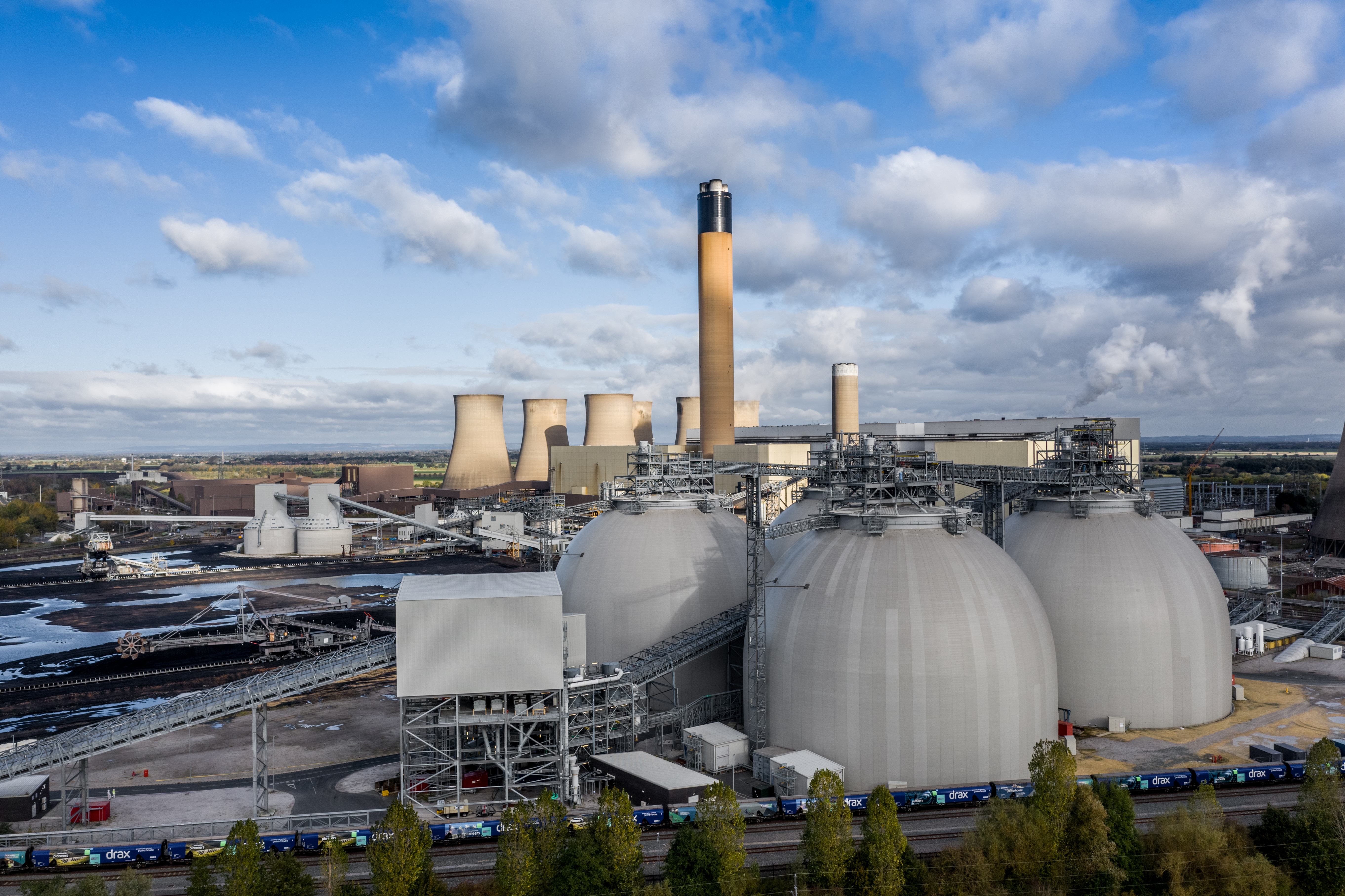 DRAX POWER STATION, YORKSHIRE, UK - NOVEMBER 4, 2021.  An aerial panorama view of Drax Power Station showing Biomass stortage tanks and carbon capture capabilities